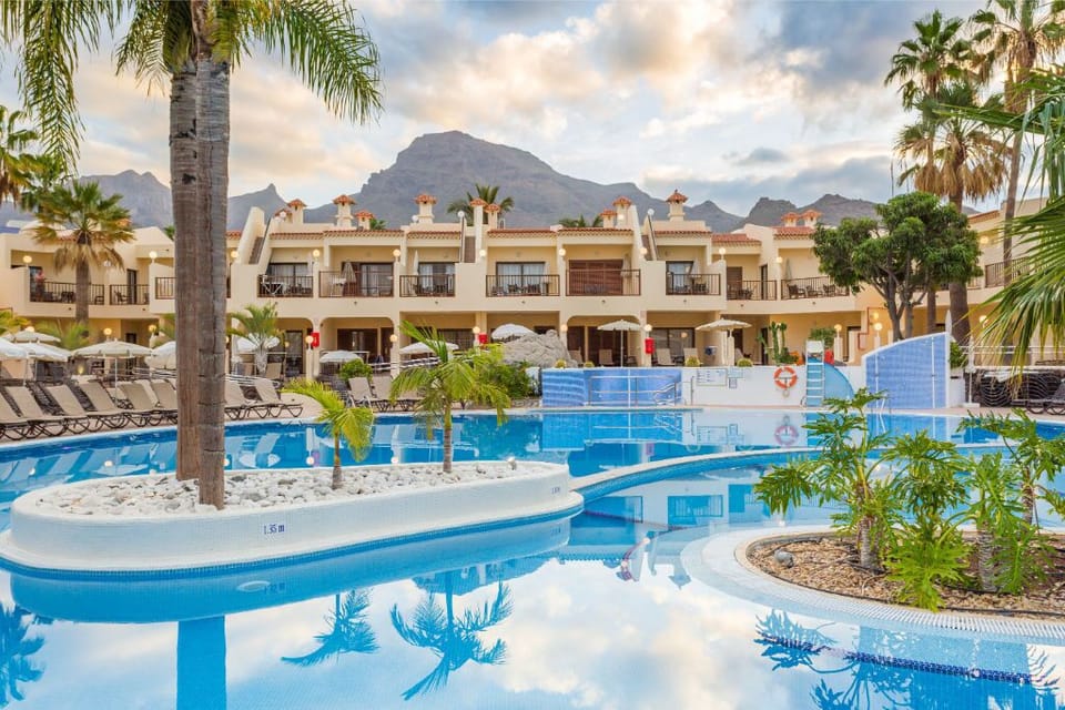 Picturesque poolside oasis, a perfect blend of relaxation and tropical charm.
