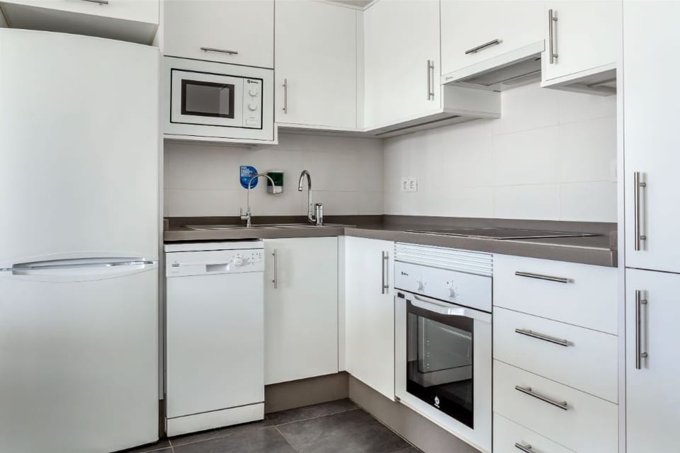 Modern, fully-equipped kitchen to inspire your culinary adventures.
