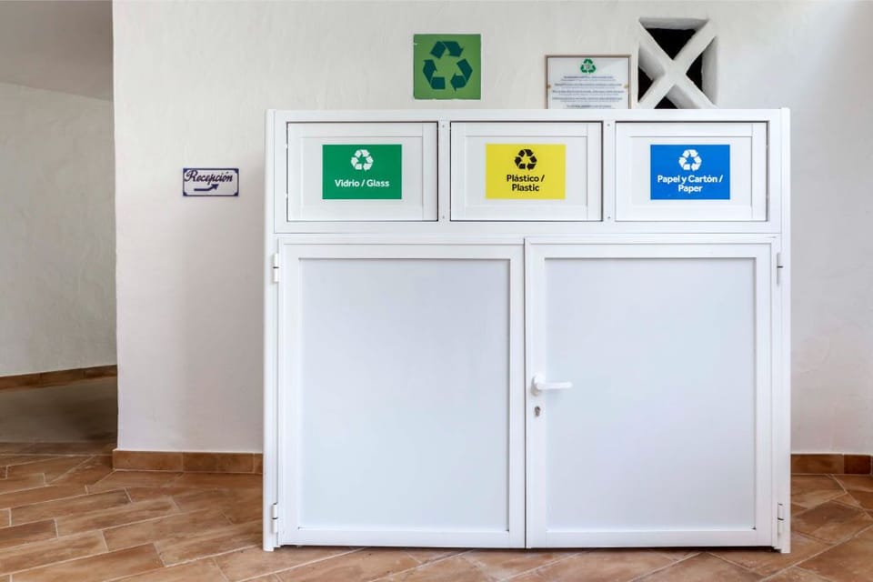 Recycling and waste disposal area, emphasizing eco-friendly practices for a sustainable stay.