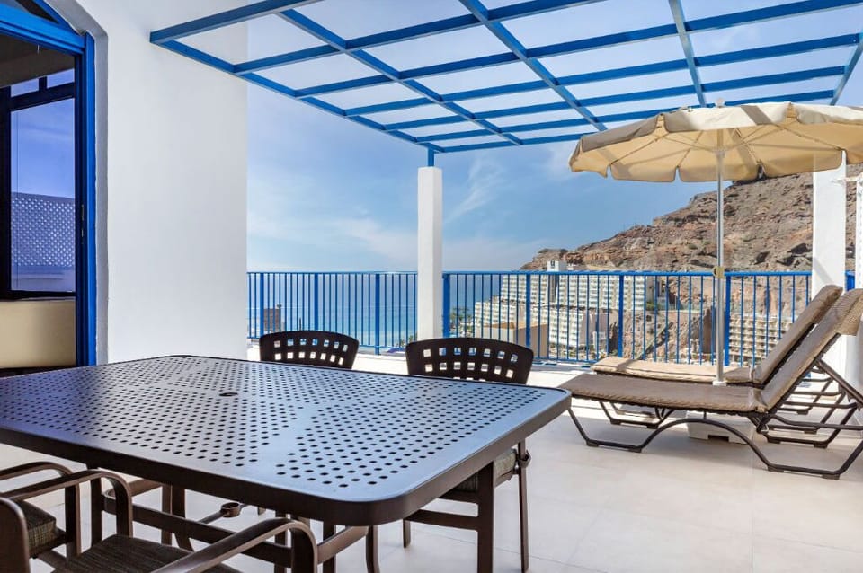 Savor your morning under the azure sky on our sun-dappled terrace.