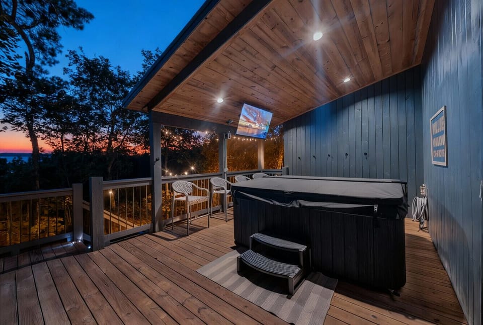 Relaxation Deck: Unwind in the hot tub while enjoying stunning sunset views and twinkling lights, while watching a movie or the big game!