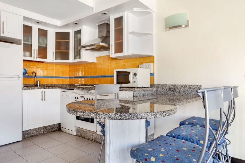 Our kitchen is a blend of convenience and style, perfect for culinary enthusiasts.