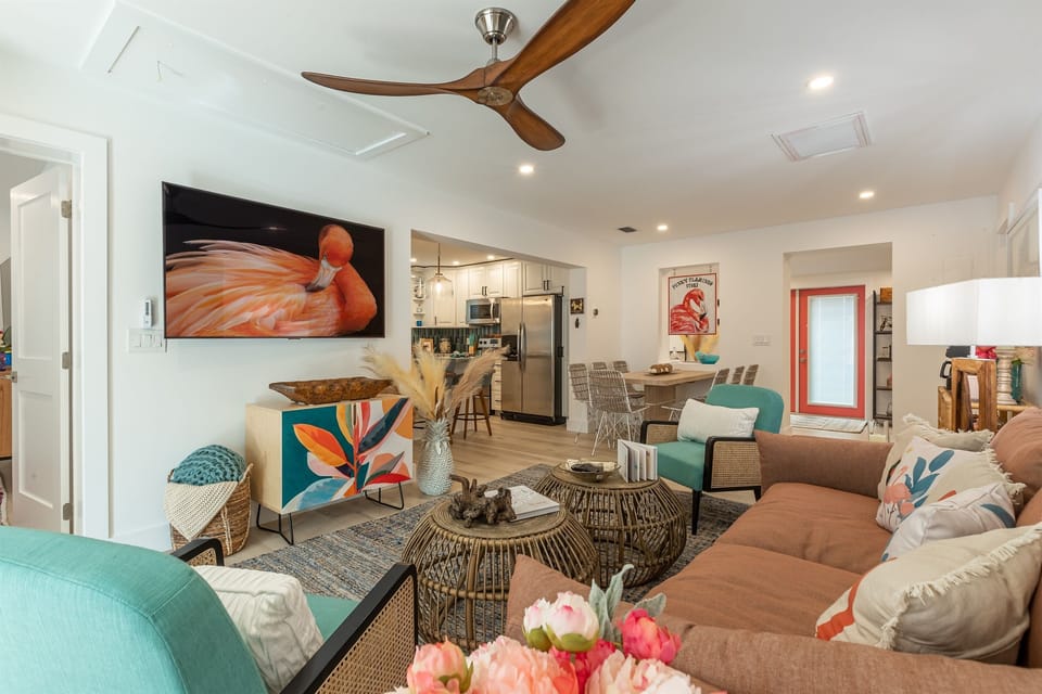 Living Room: Bright and vibrant space with tropical decor, perfect for relaxation and fun!