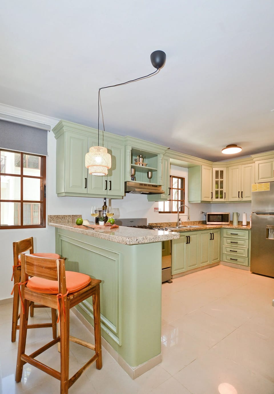 The kitchen is fully equipped and open to the living area!