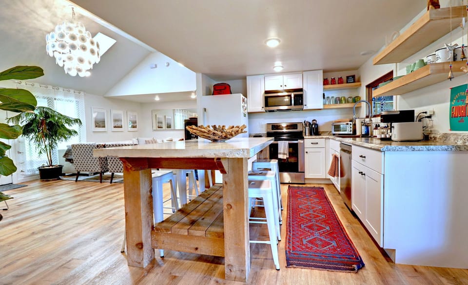 Open concept living room, kitchen and dining