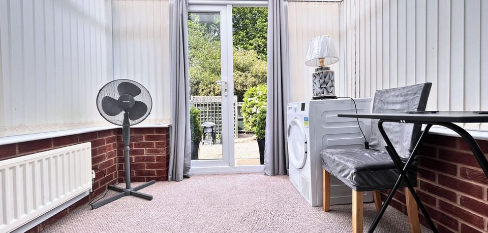 Sun room with chairs and table