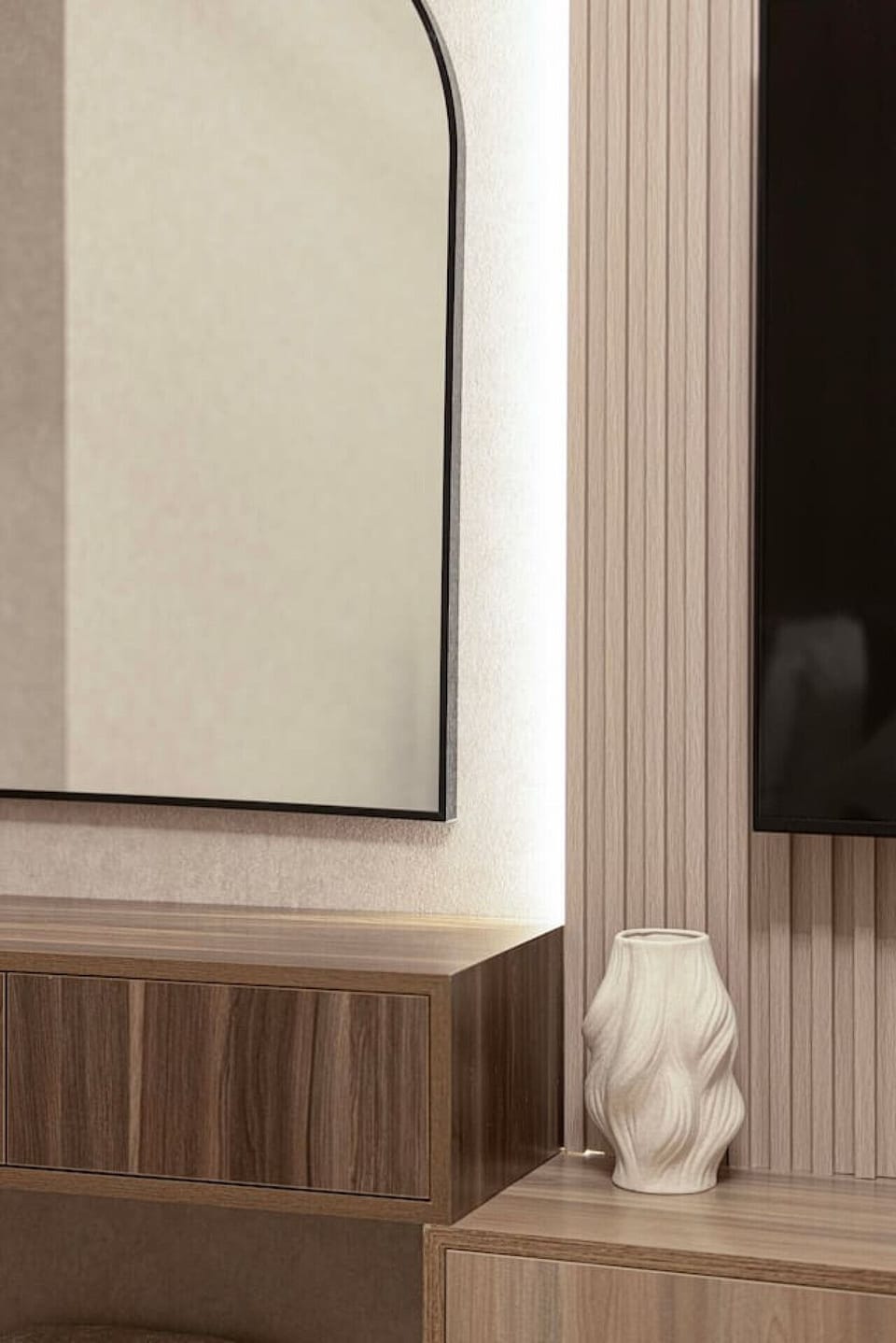 Enhance your stay with a stylish bedroom mirror framed by elegant décor, adding a touch of sophistication and brightness to the modern space in this luxurious Downtown Dubai apartment.