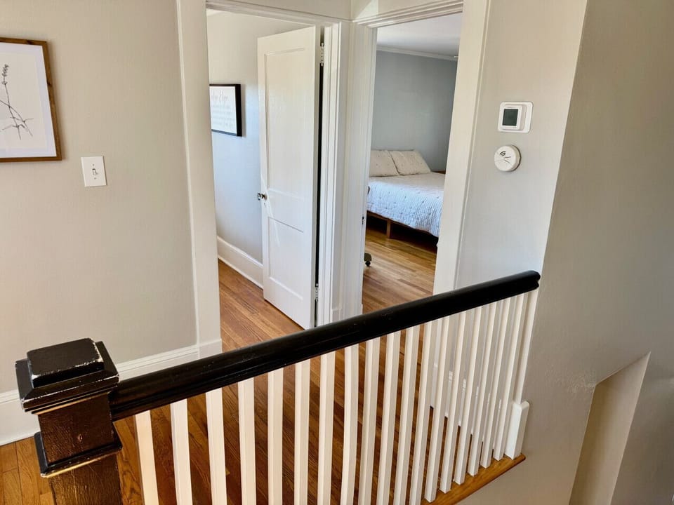 Primary Bedroom on right. 1 twin bed room on the left.