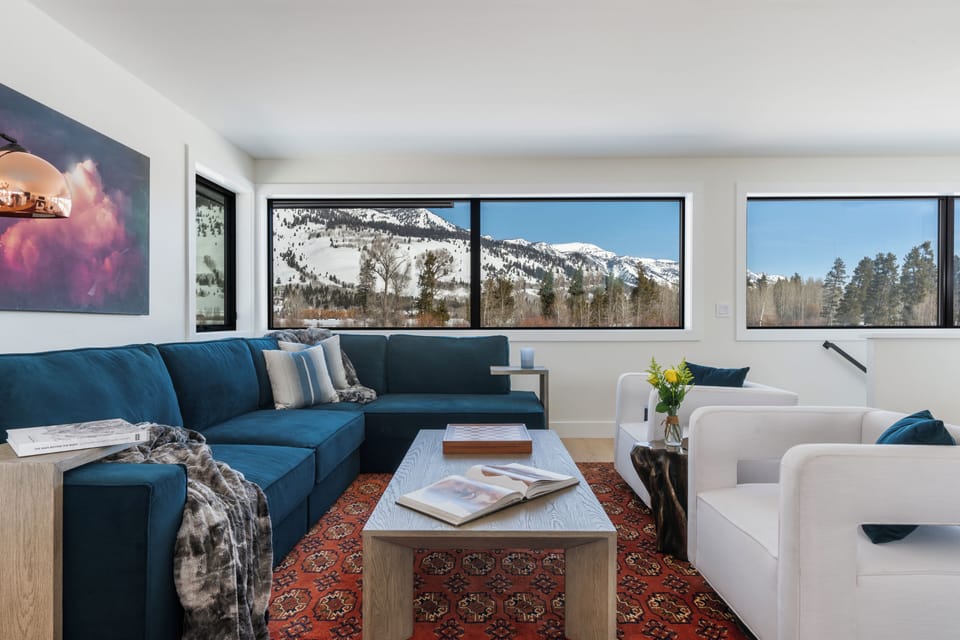 Enjoy panoramic mountain views from the comfort of the living room
