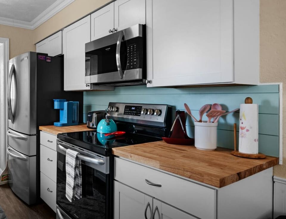 Fully stocked kitchen with modern appliances