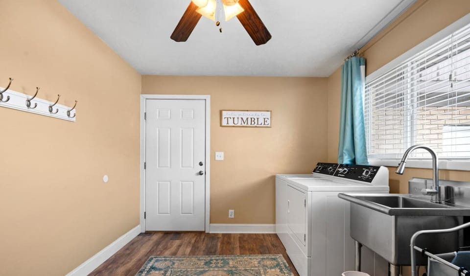 Spacious laundry room with sink