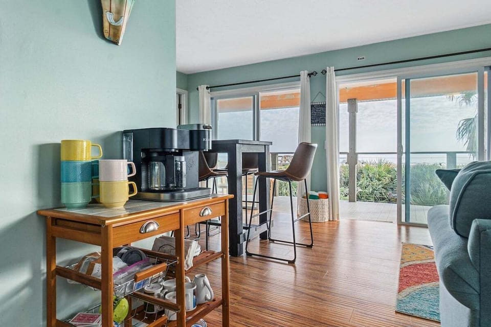 Tucked into one corner, a charming coffee bar adds a cozy touch, perfect for starting your morning with a fresh brew.