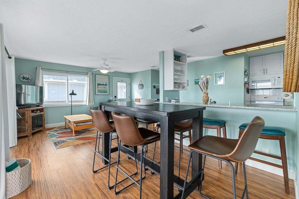 A dedicated coffee area in front of the second sliding door to the deck ensures you can sip your favorite drink while enjoying the natural light and beautiful views.