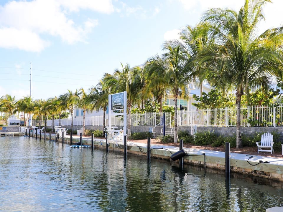 A serene waterfront setting with private dock access, perfect for enjoying peaceful coastal moments.