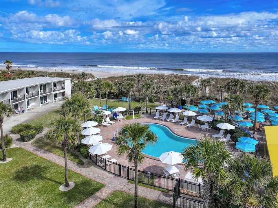 Soak up panoramic pool views with the ocean beyond.
