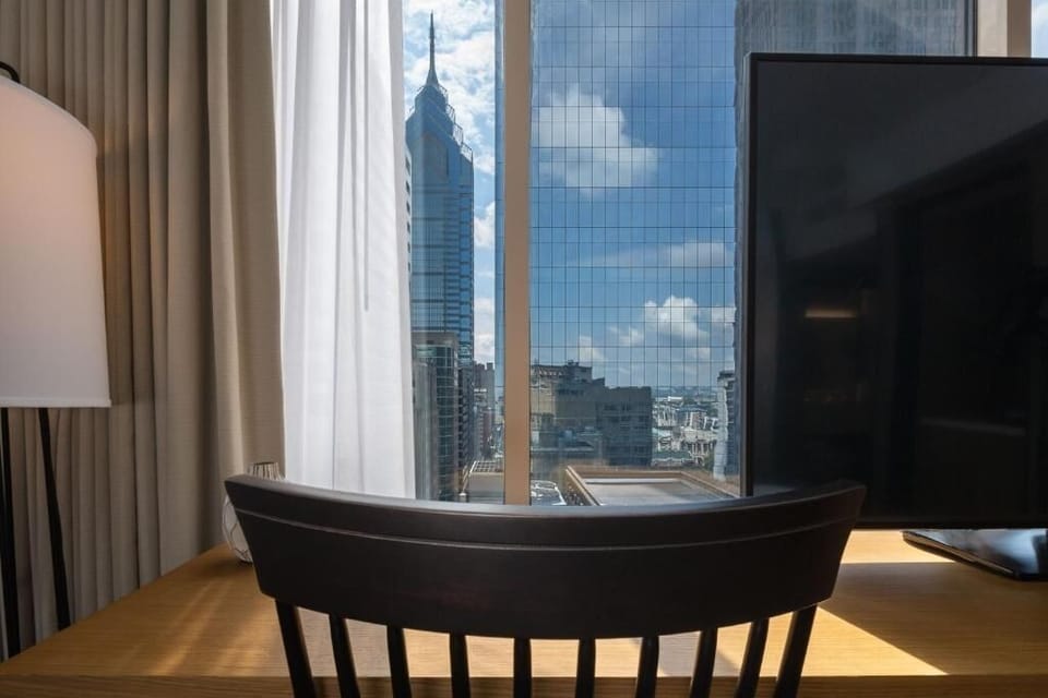 Work with inspiring city views right from your in-room desk.