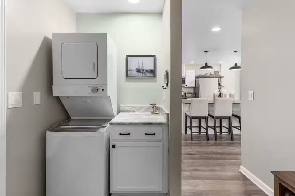 Laundry area with laundry pods provided