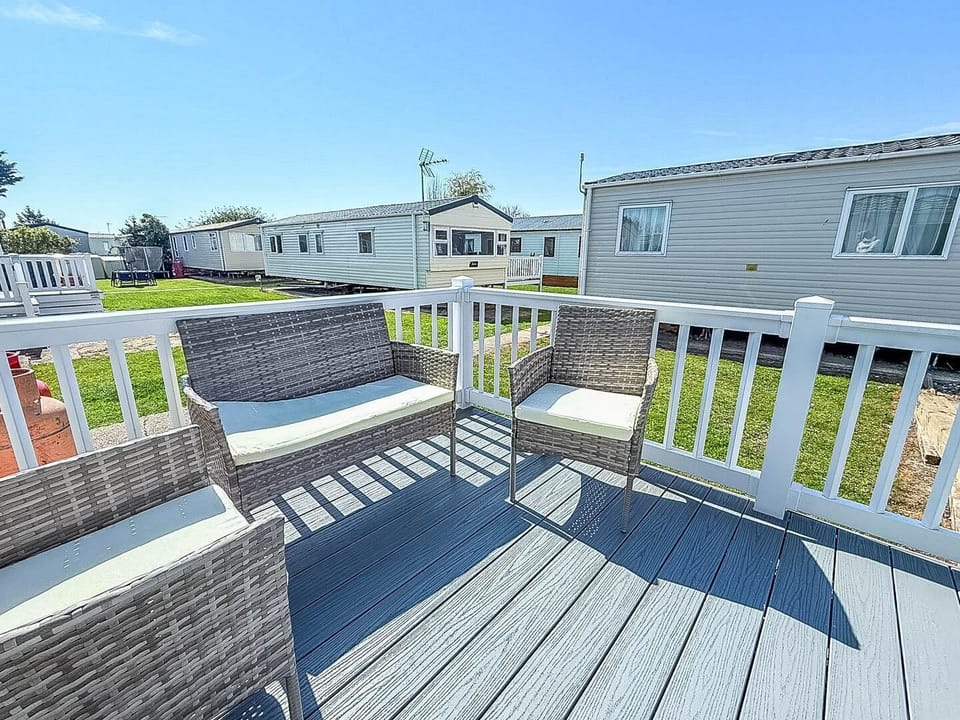 Relax on the caravan decking with a cup of tea and soak up the sunshine.
