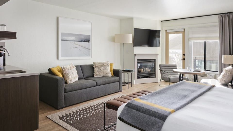 Gather fireside, then drift to sleep in cozy comfort.