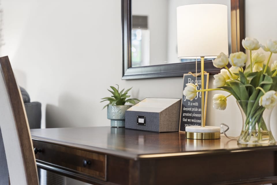 Bright and inviting workspace with a writing desk and natural light perfect for remote work or planning your day