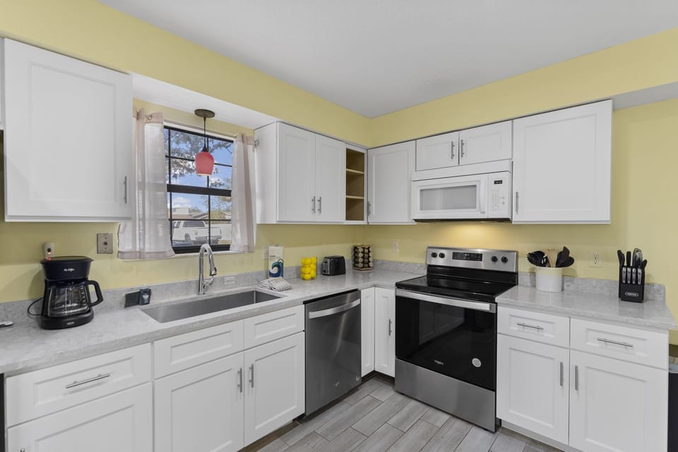 Fully equipped kitchen with modern appliances for all your cooking needs.