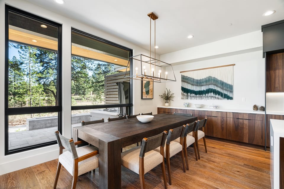 The dining table seats up 10 people and offers stunning views of the Gray's Crossing Golf Course.
