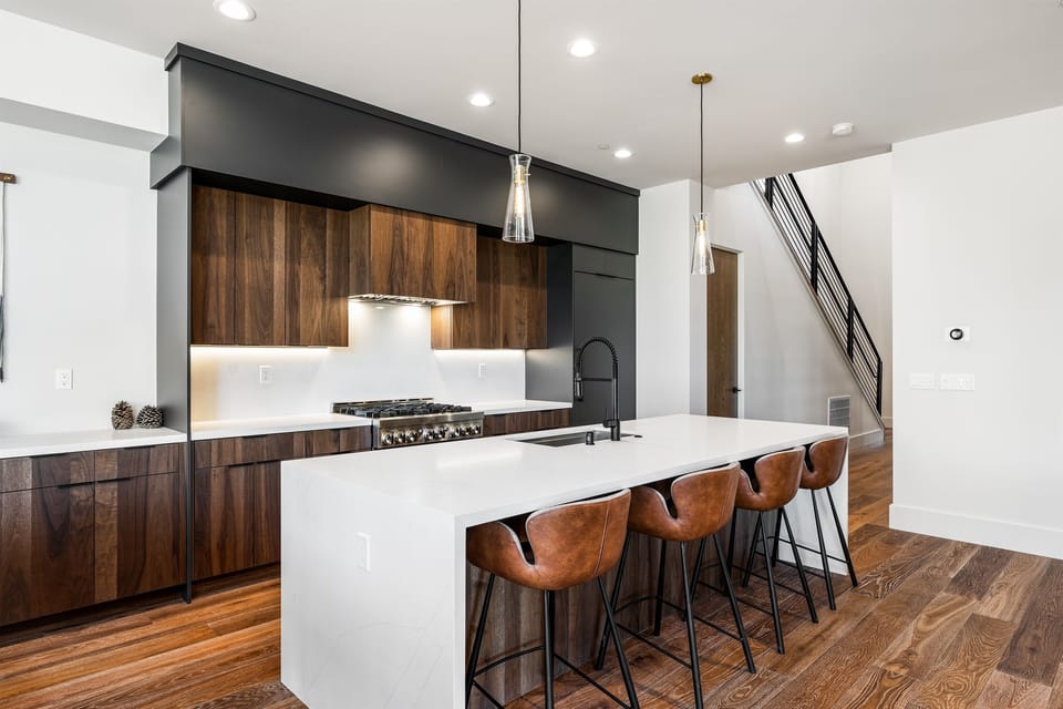 A chef's delight! The gourmet kitchen features sleek countertops, state-of-the-art appliances, and an island perfect for meal prep or casual dining.