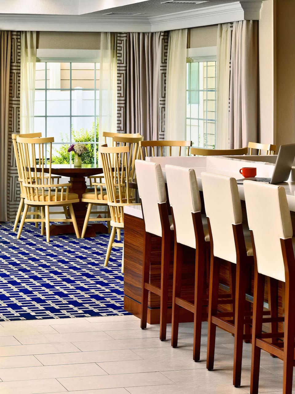 Settle in for breakfast and work with bright window views.