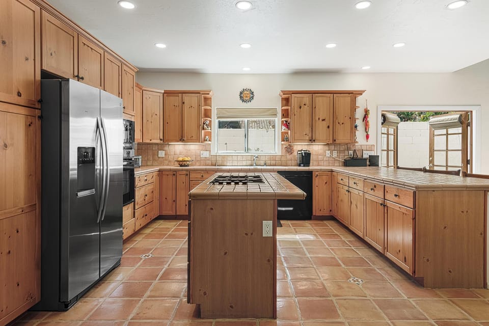 Fully equipped kitchen with island and loads of counter space for all the chefs