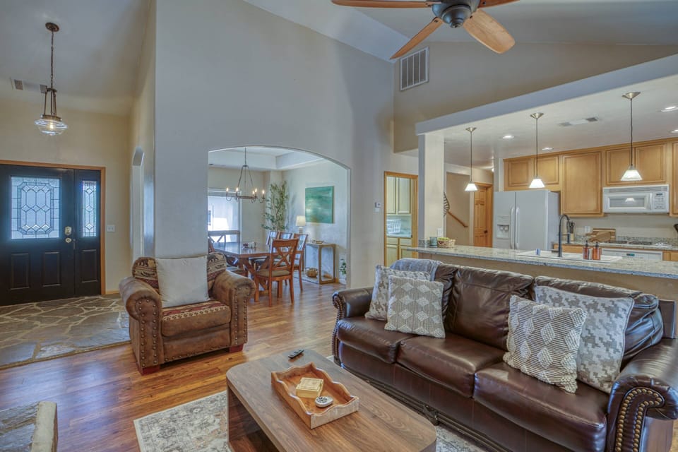 This open concept main floor has a large dining table and eat in kitchen. The thoughtful layout is perfect for family gatherings. Home away from home!