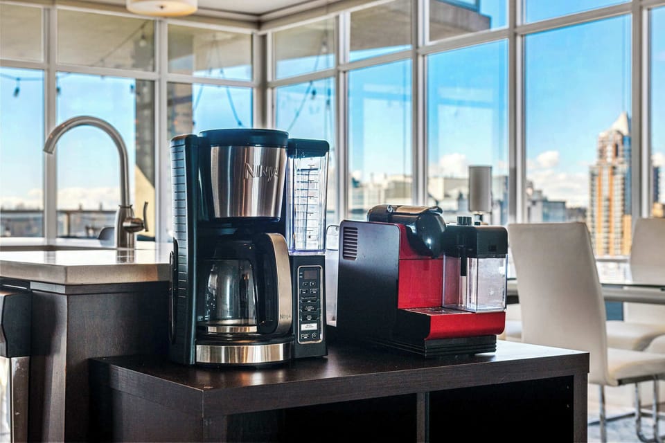  A sleek coffee station with all the essentials, perfect for your morning brew.