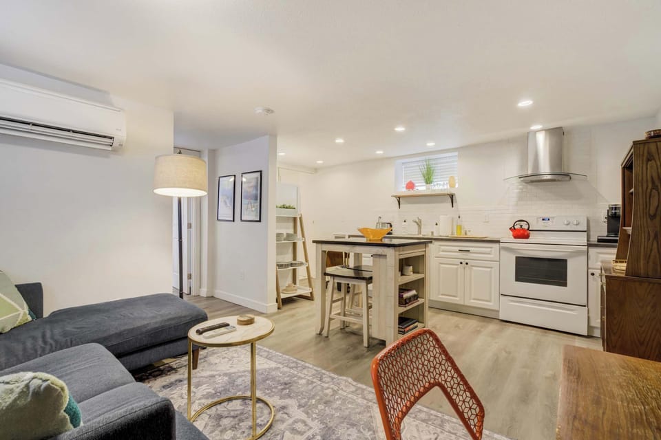 Warm and welcoming living space with a fully-equipped kitchen, cozy seating, and a stylish design perfect for relaxing or entertaining.










