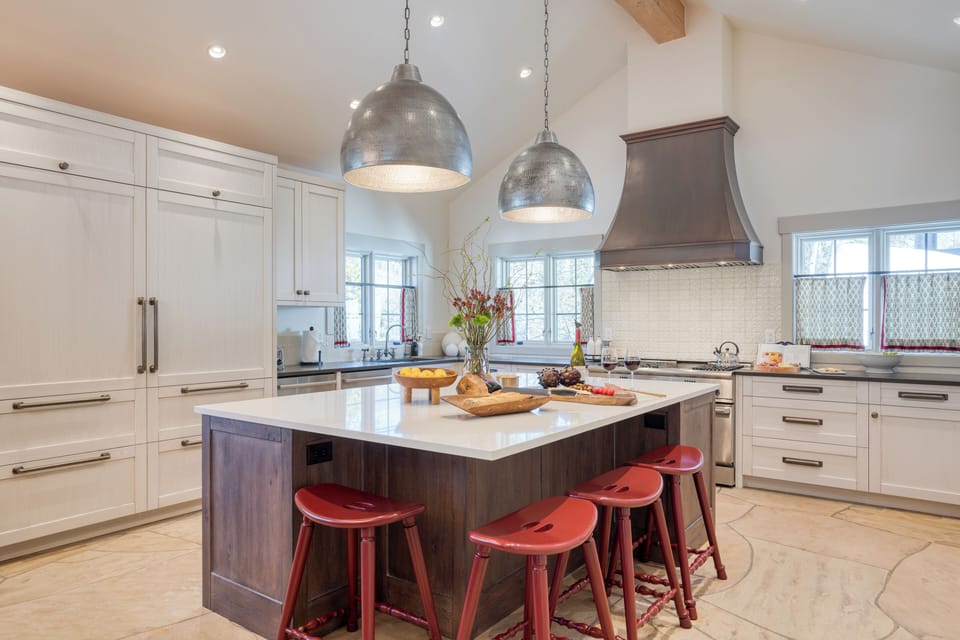 To cook in this kitchen is a dream with the vaulted ceilings, lots of light, and tons of counter space. 