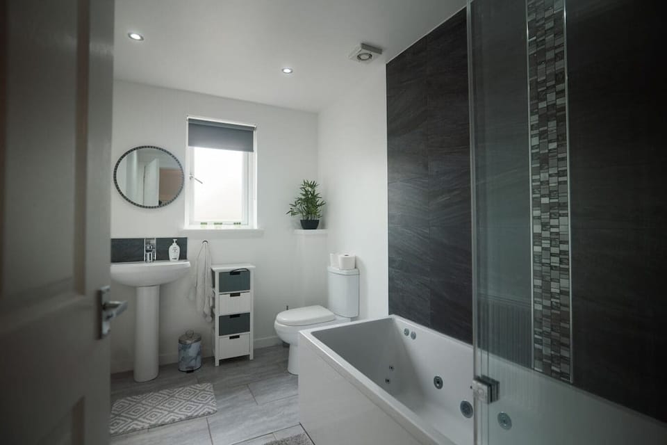 Clean and modern bathroom with fresh towels and essentials