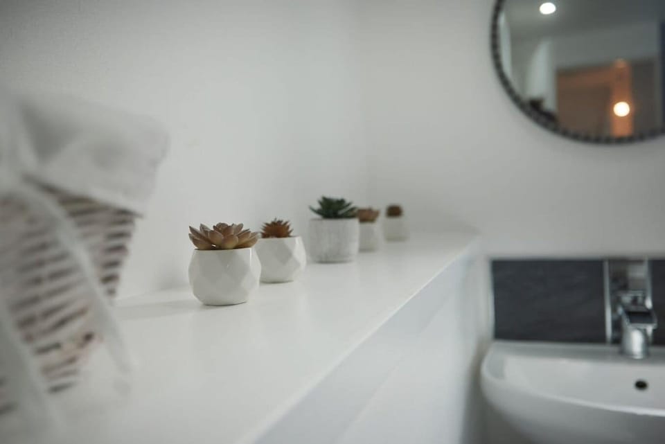 Thoughtfully curated décor adds a warm and welcoming touch to the space, creating a calming atmosphere where every little detail is designed to make you feel at home.