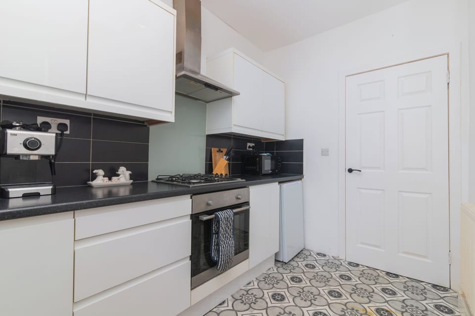 A stylish and functional kitchen perfect for family meals, entertaining friends, or enjoying quiet mornings.