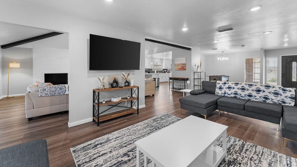 Step into your dream retreat! 🌟 Our chic living room features cozy couches, perfect for lounging and movie nights on the big screen! 🎬✨ Unwind in style and comfort at our stunning space—your ultimate getaway awaits! 🏡💖