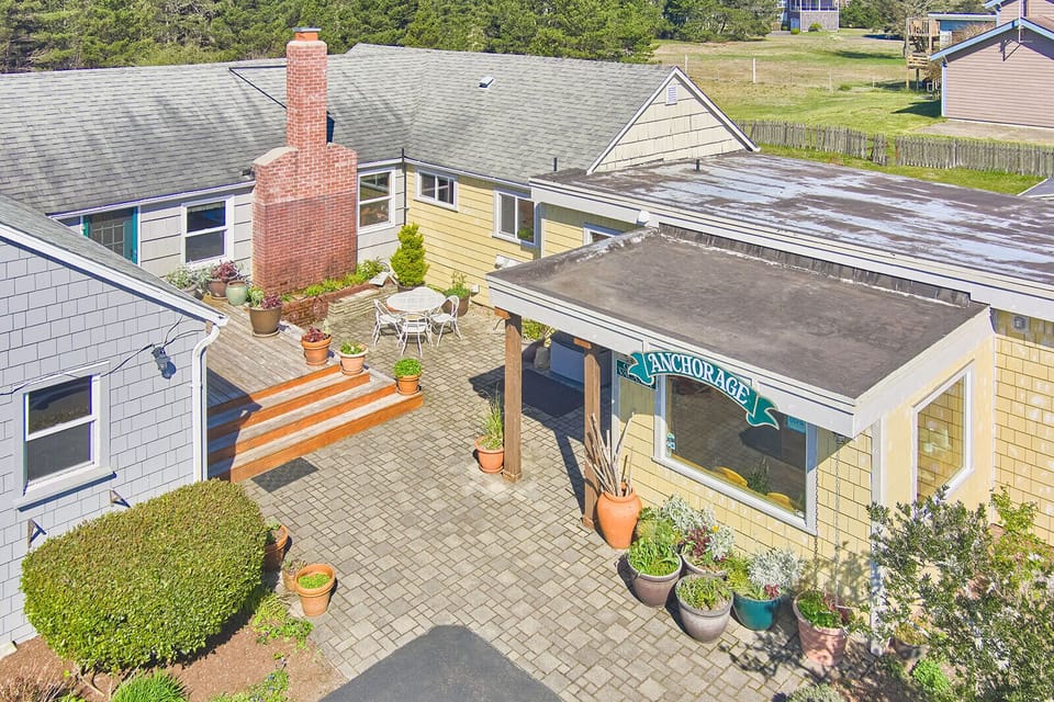 Inviting shared outdoor space with seating—perfect for relaxing, socializing, or enjoying the fresh air.