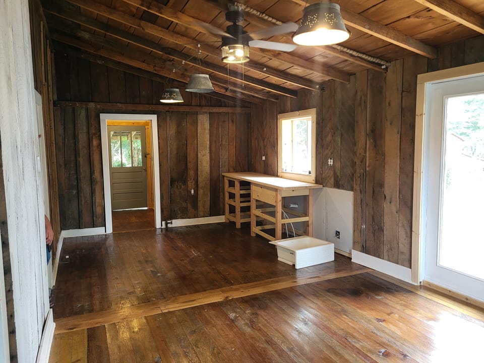 Kitchen during restoration .... notice vintage wash tub light fixtures