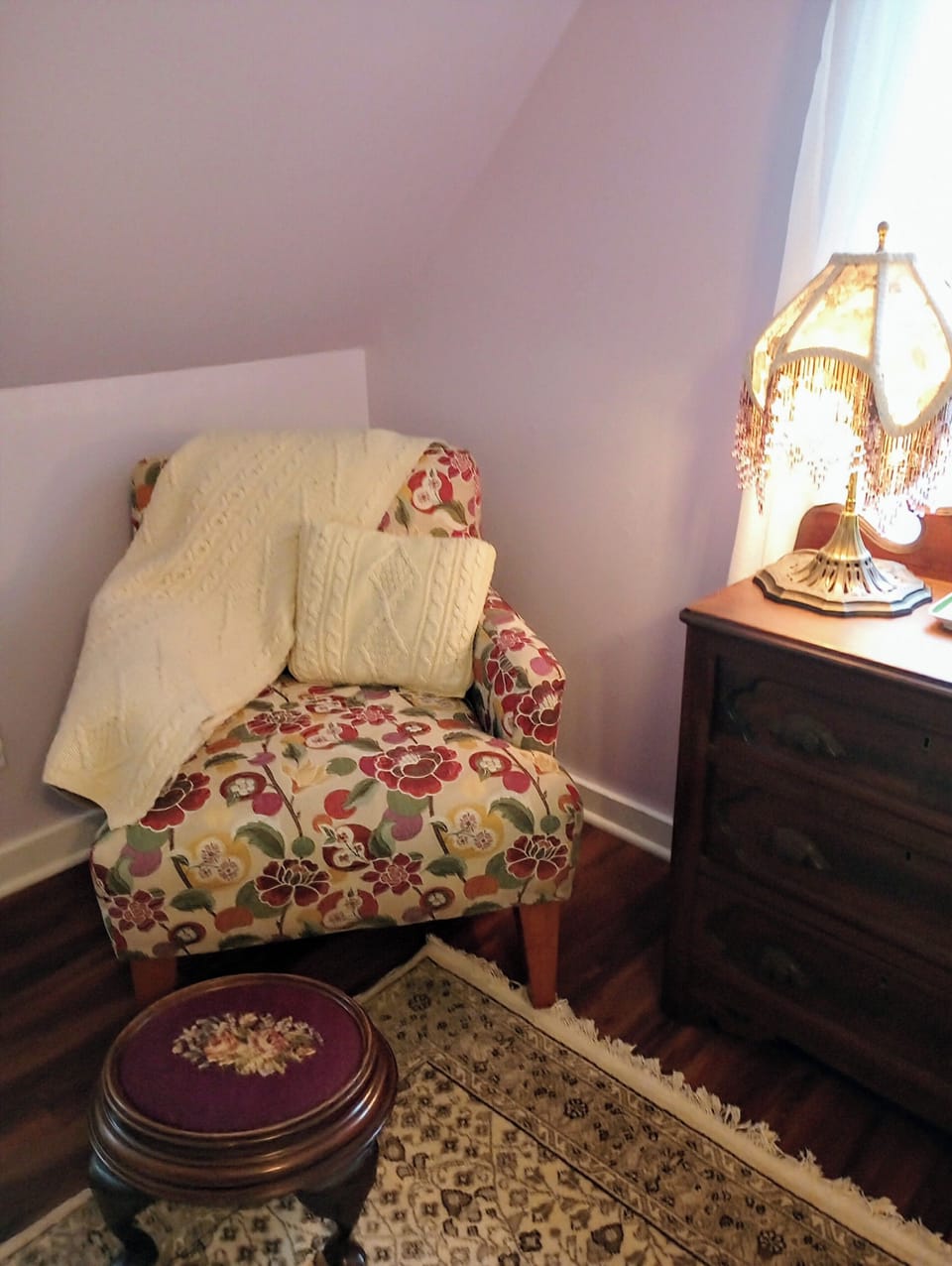 Cozy reading nook, perfect for unwinding with a cup of tea and favorite book