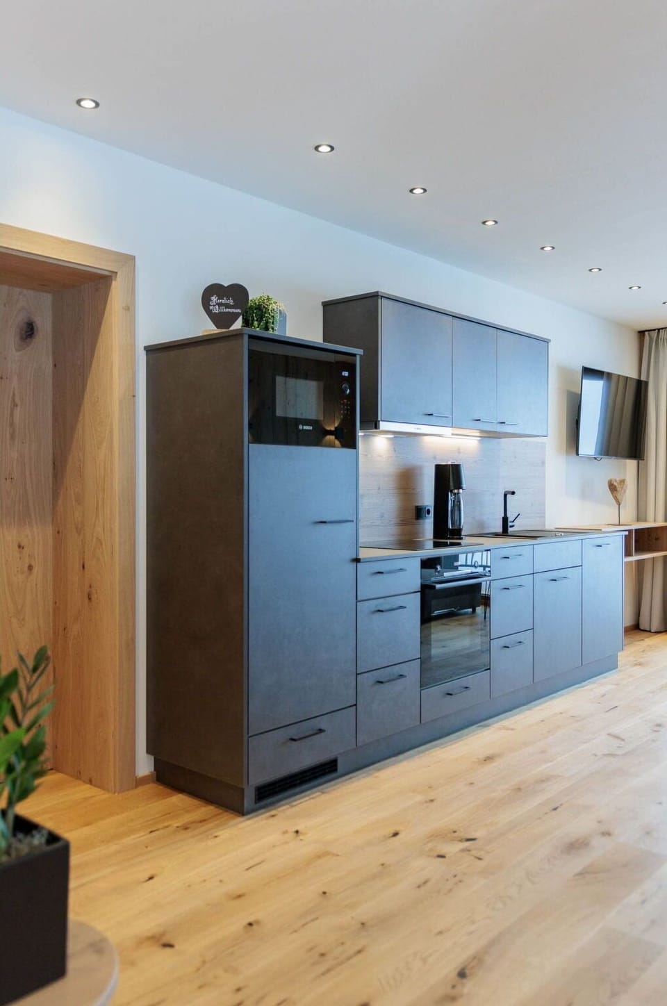 Furniture, Flooring, Interior Design, Cabinetry, Floor, Wood, Wood Flooring, Kitchen, Countertop, Ceiling