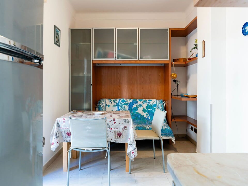 Furniture, Interior Design, Wood, Flooring, Floor, Room, Lighting, Cabinetry, Kitchen, Ceiling