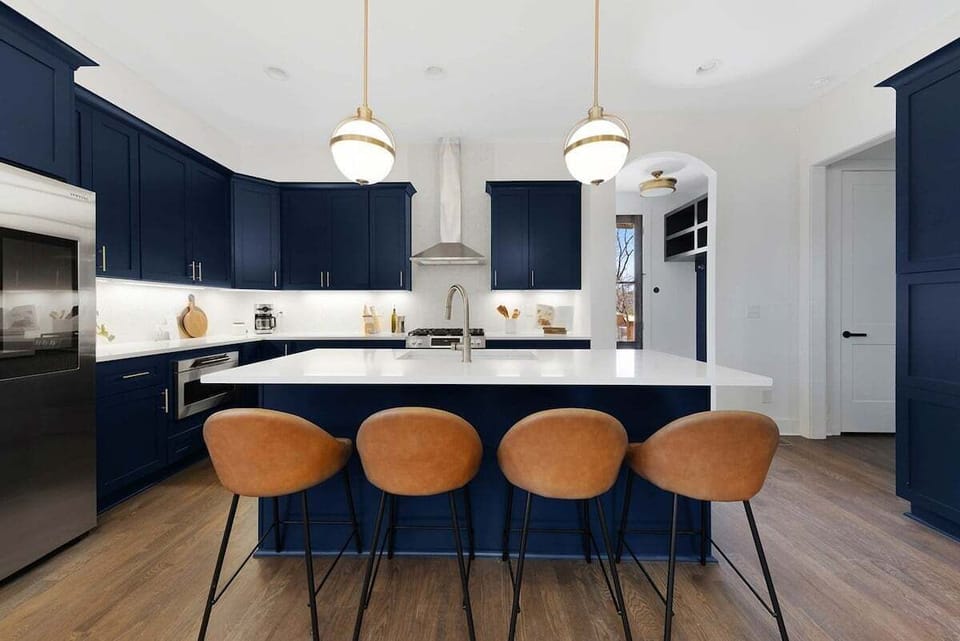 Kitchen overview with seating for 4 at the island