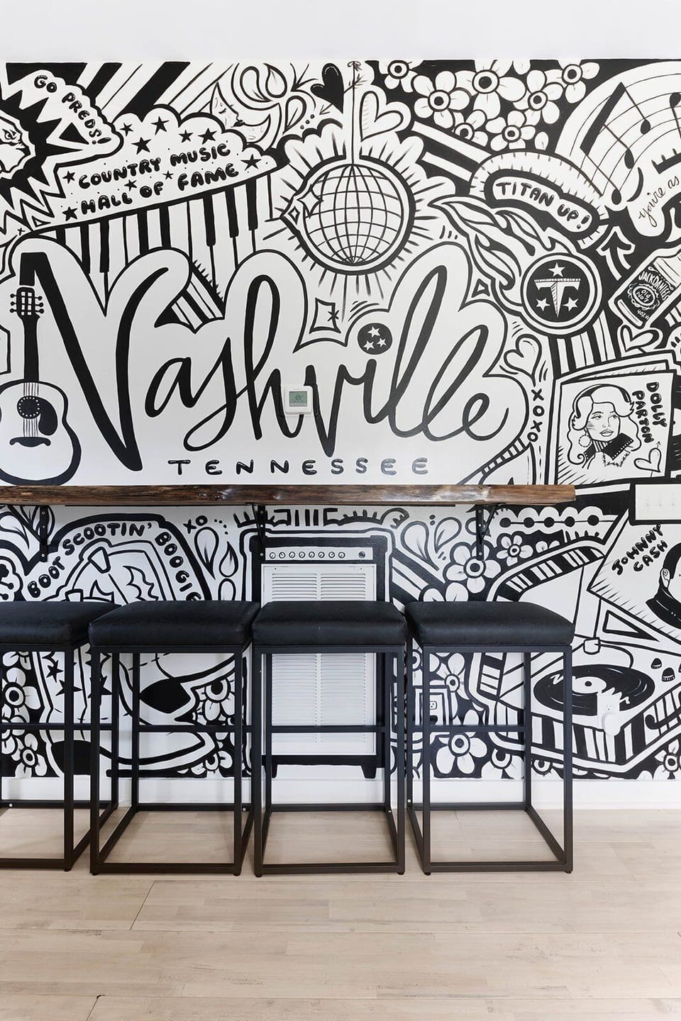 Bold wall art meets boutique style—a signature touch of personality.