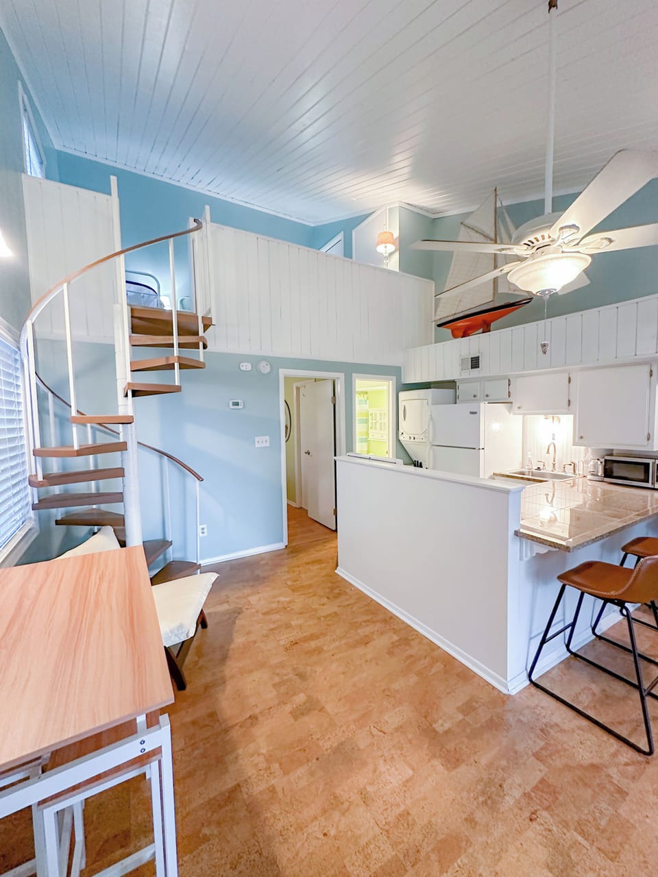 Master bedroom & bathroom doors. Convenient laundry stack.
