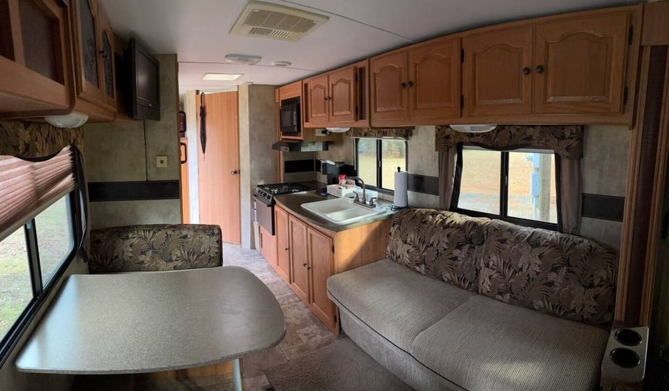 View of living room/kitchen area.
