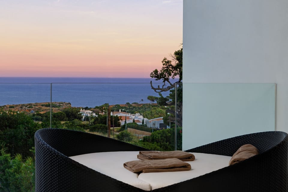 Poolside area with sun loungers