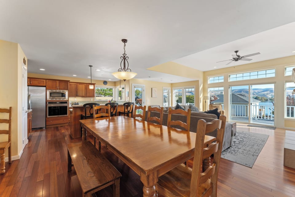 Dining area with seating for 10-12 & kitchen bar seating for 3