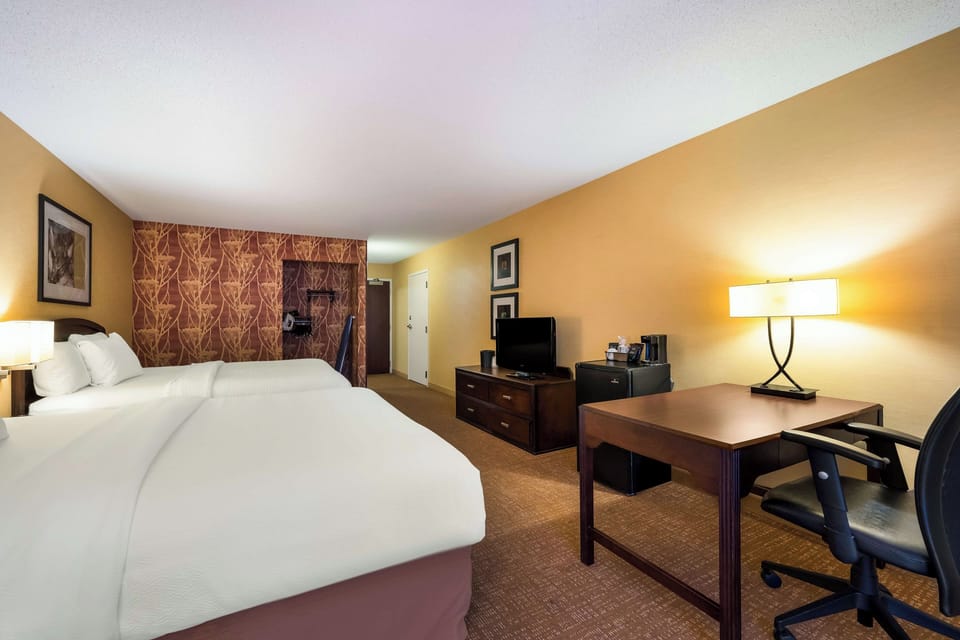 Spread out with extra sleeping space and a convenient workspace.