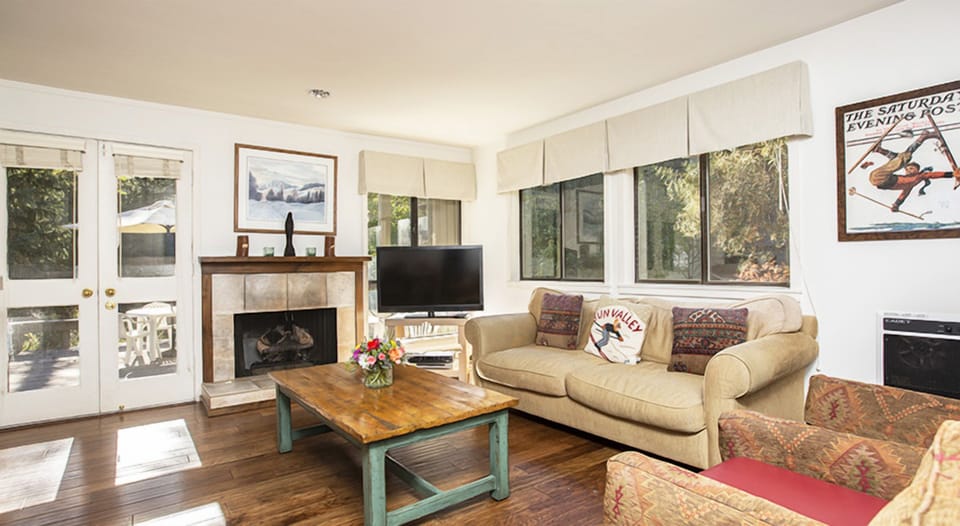 Gather by the fireplace for relaxed evenings and easy conversation.